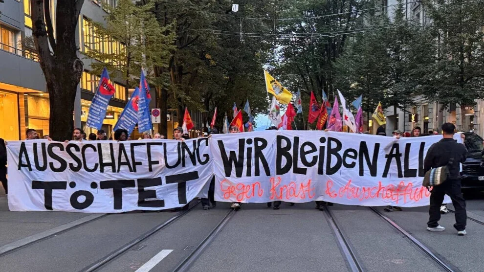 Protest in Zürich tegen uitzettingen: „Menselijke waardigheid kan niet worden uitgezet“